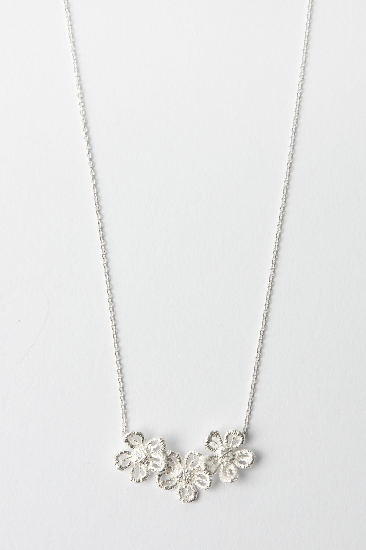 3 Silver Brushed Flowers Necklace